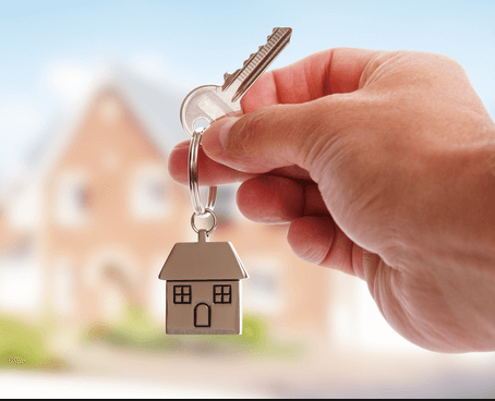 Happy couple cheering their successful new home purchase thanks to Prime Rate Mortgage ™